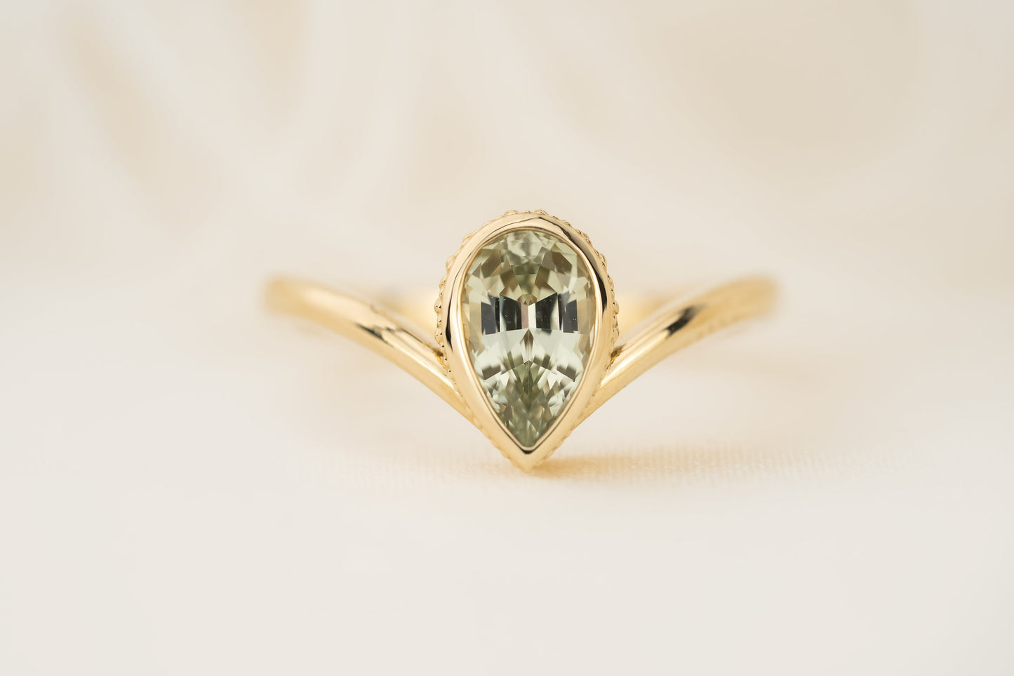 The Contoured Sitara Ring | 1.22 CT Pear Green Sapphire