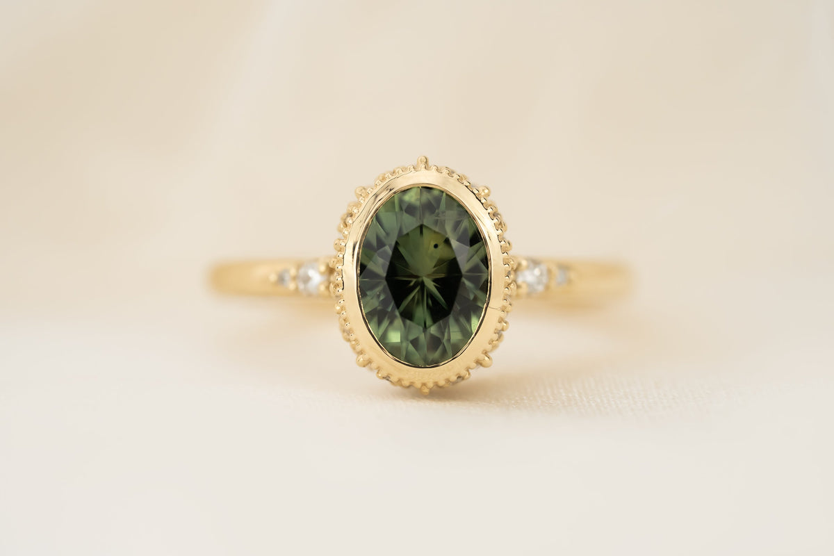 the-sitara-ring-1-78-ct-forest-green-oval-montana-sapphire-faceted-by-eric-trudell