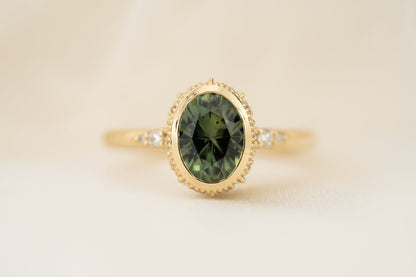 the-sitara-ring-1-78-ct-forest-green-oval-montana-sapphire-faceted-by-eric-trudell