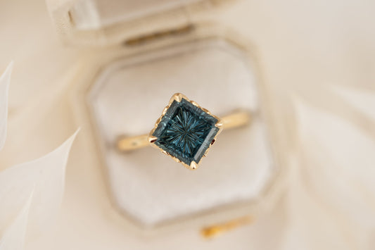 the-secret-garden-ring-3-44-ct-radiant-starbrite™-teal-sapphire
