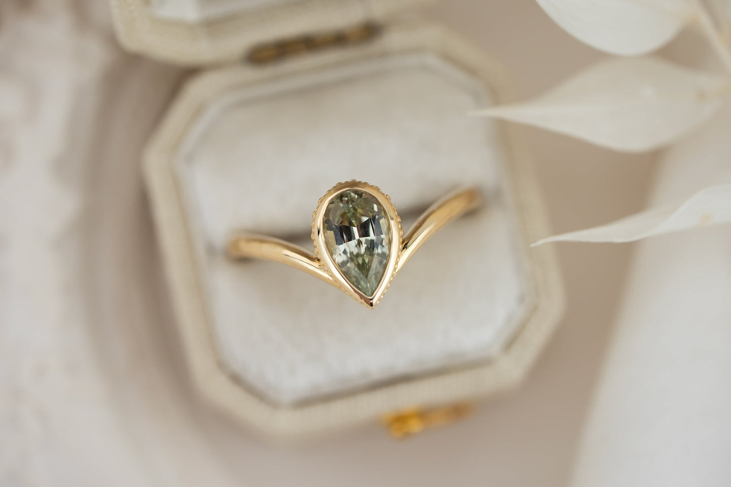 The Contoured Sitara Ring | 1.22 CT Pear Green Sapphire