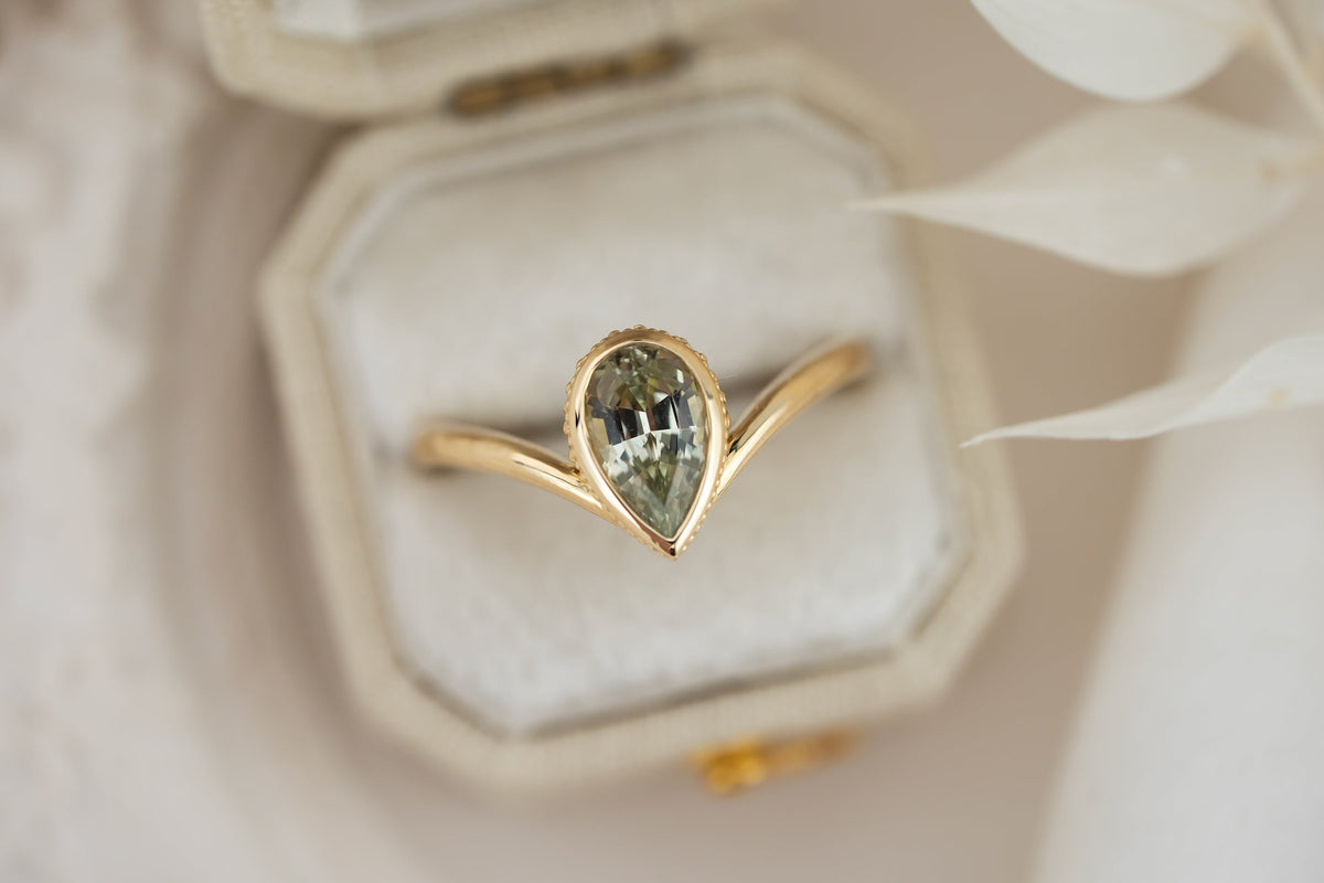 new-bezel-1370560-1-22-ct-pear-green-sapphire