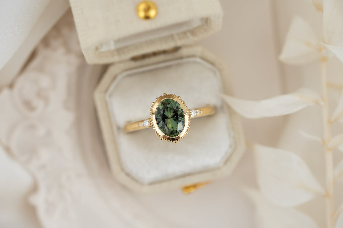 the-sitara-ring-1-78-ct-forest-green-oval-montana-sapphire-faceted-by-eric-trudell