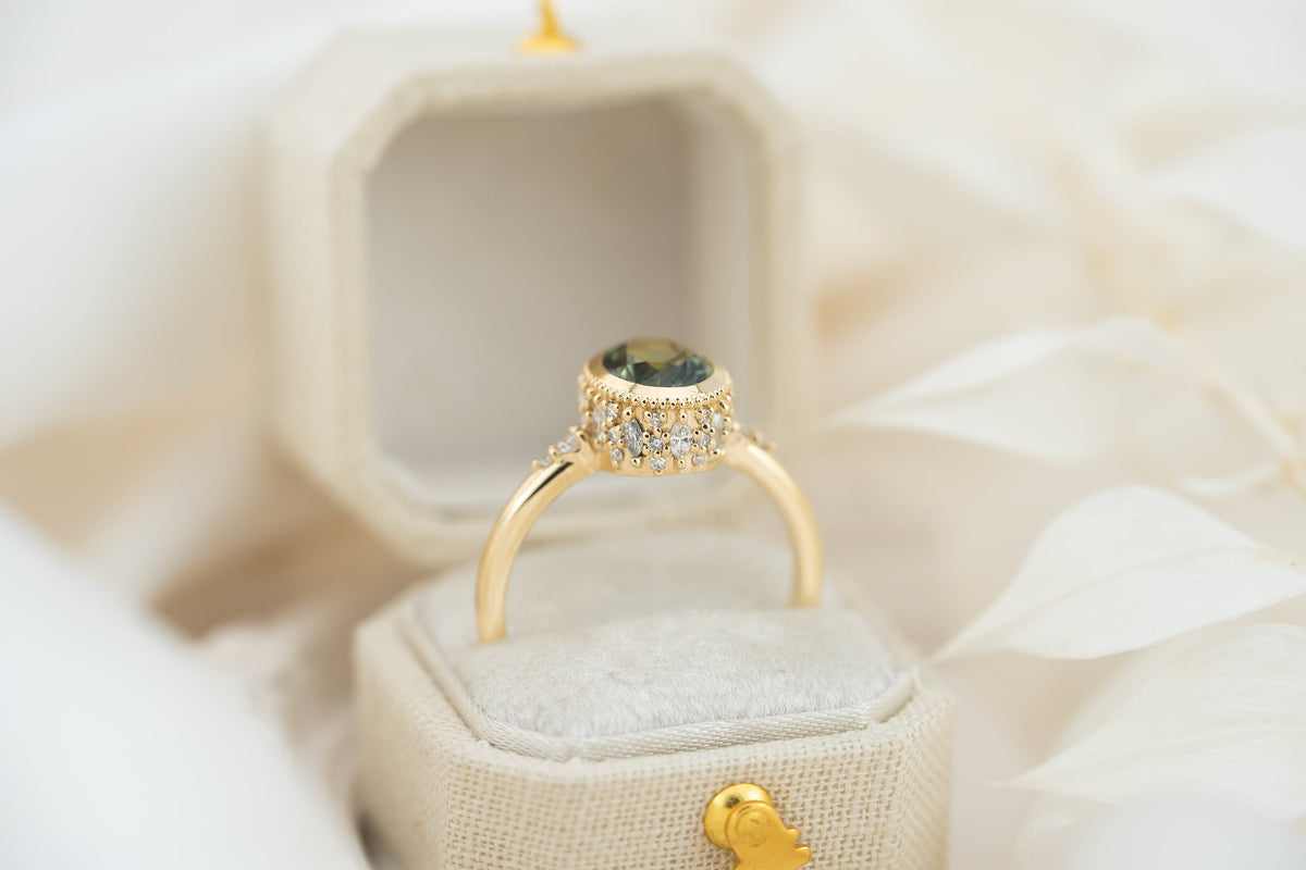 the-sitara-ring-1-78-ct-forest-green-oval-montana-sapphire-faceted-by-eric-trudell