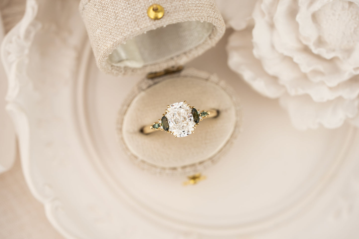 The Maeve Ring | 2.08 CT Elongated Cushion Diamond + Dark Green Sapphire Accents