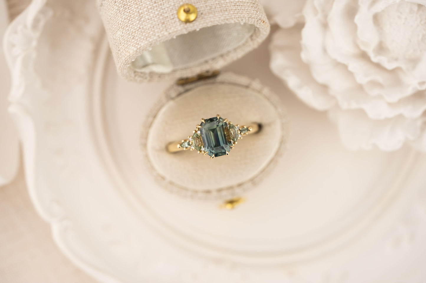 The Maeve Ring | 2.59 CT Emerald Cut Teal Sapphire + Green Sapphire Accents