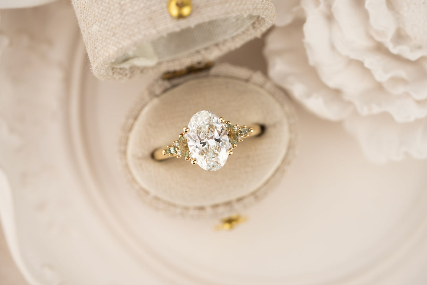The Maeve Ring | 2.07 CT Oval Diamond + Light Green Sapphire Accents