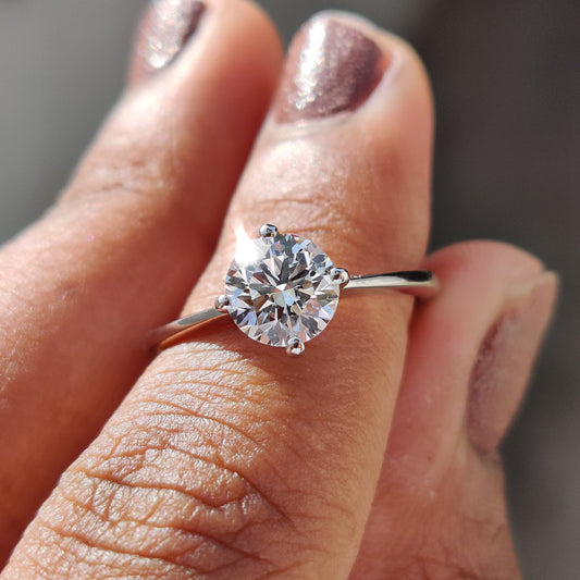 Round Solitaire Engagement Ring With Tapered Shank Design