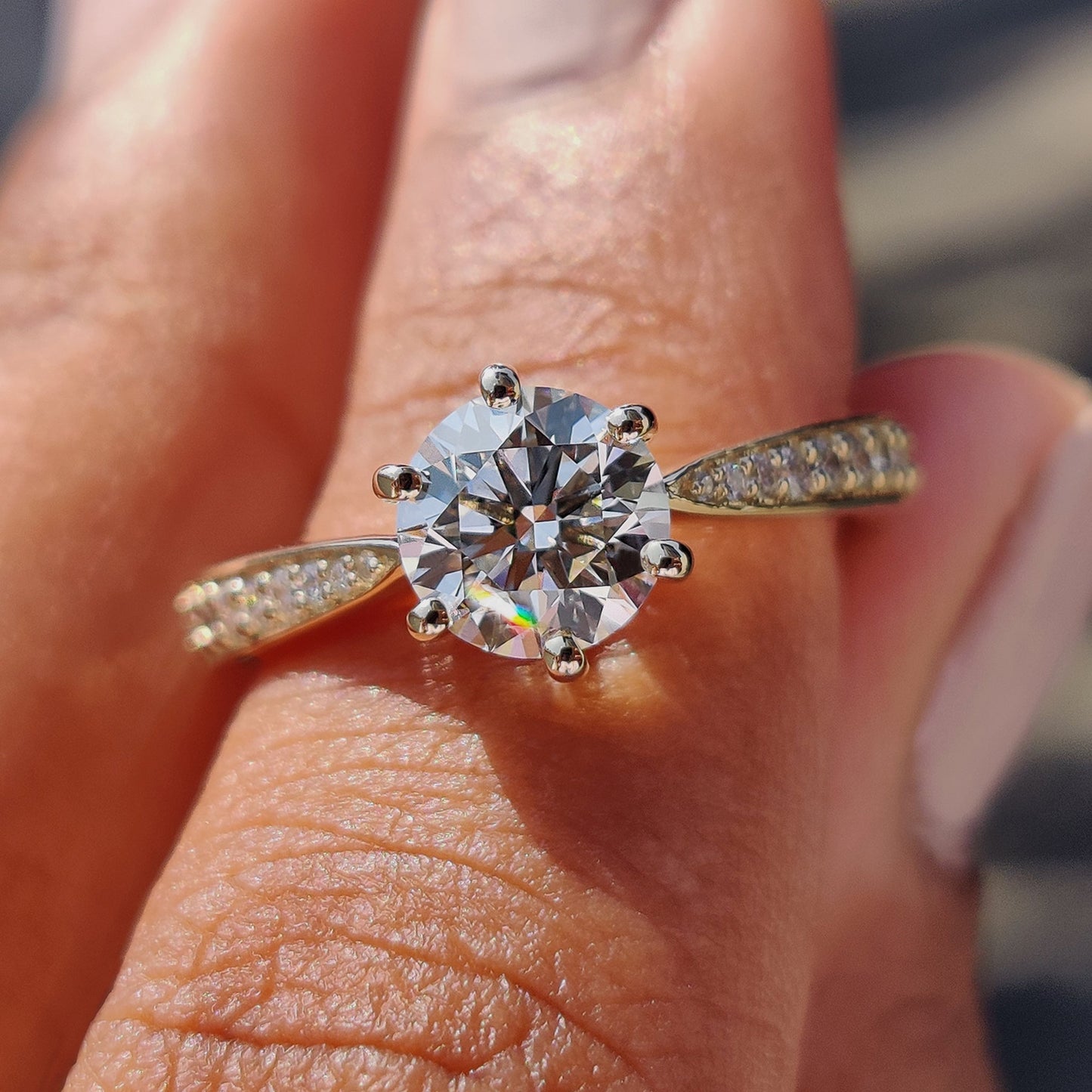 Round Cut Engagement Ring with Tapered Pave Setting