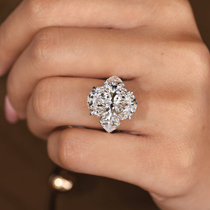 IGI Certified 10 -15 Carat Oval Diamond Ring in Three Stone Style