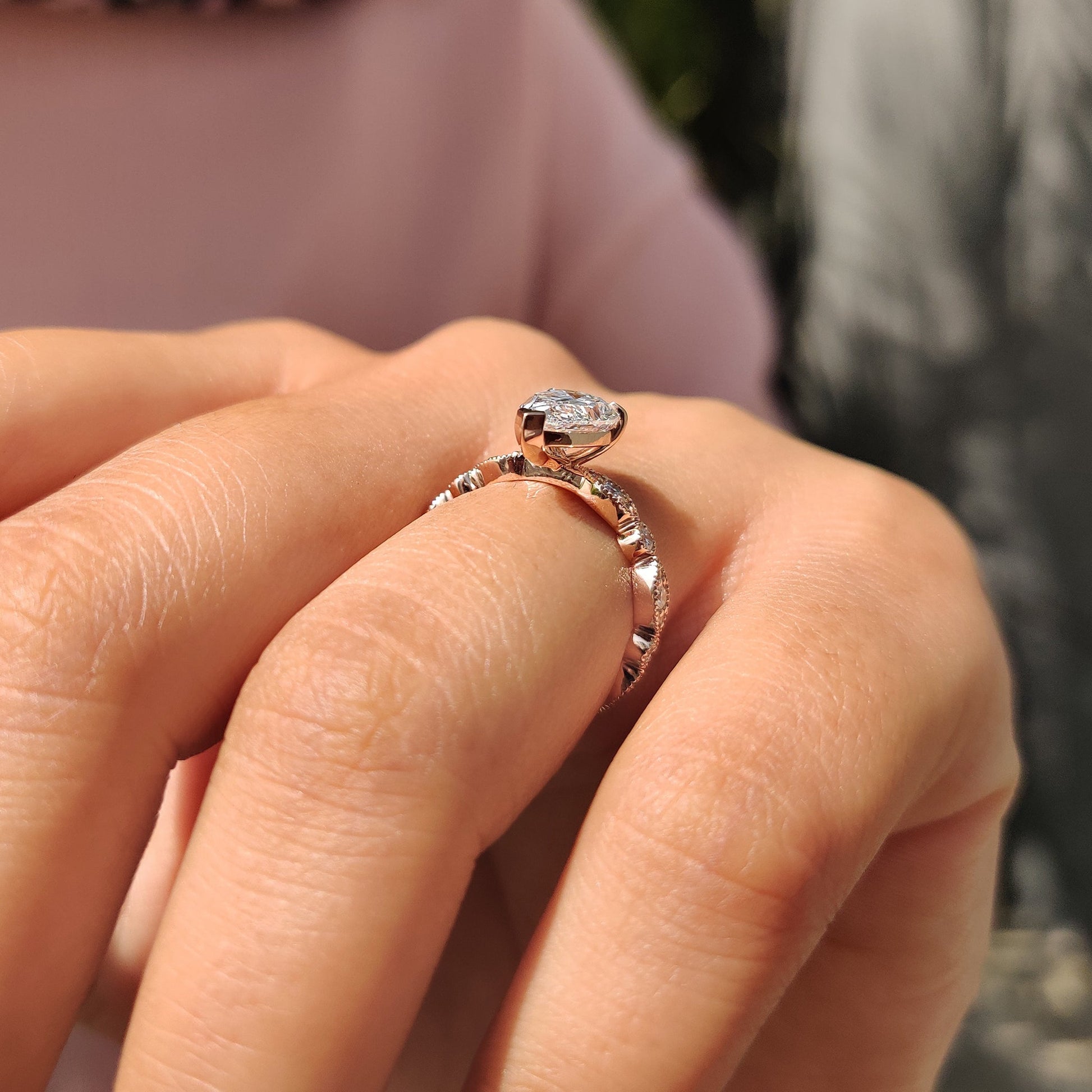 Pear Diamond Ring With Round Side Stone