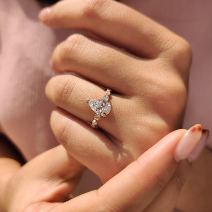 Pear Diamond Ring With Round Side Stone