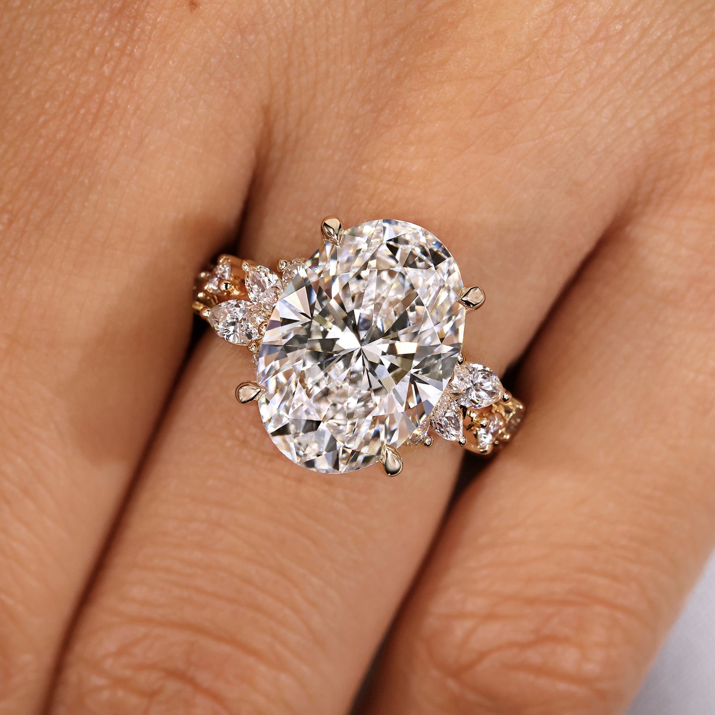 IGI Certified 5 - 7 Carat Oval Cut Diamond Ring in Cluster Setting