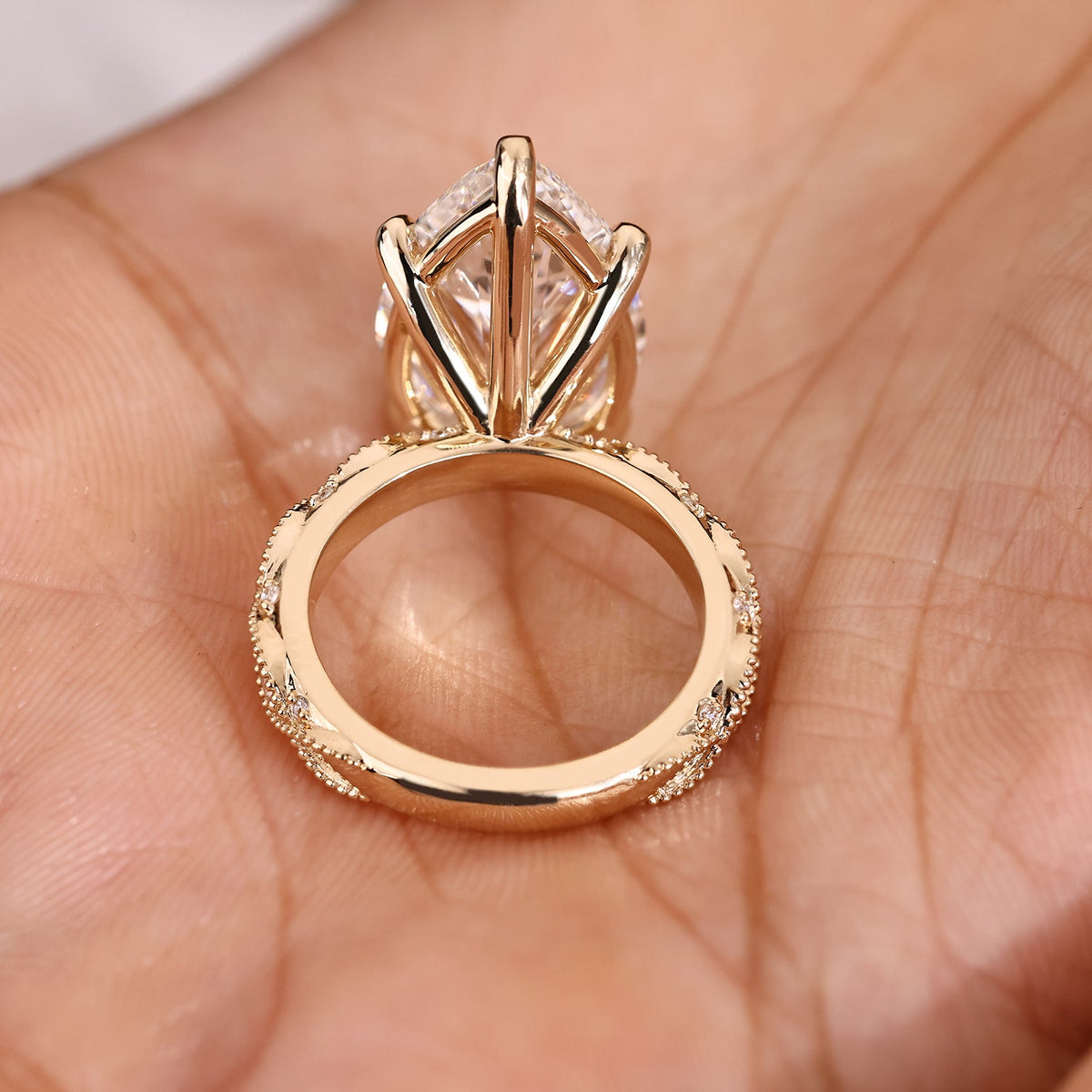 10 Carat Pear Shaped Diamond Ring with Marquise and Round Pave