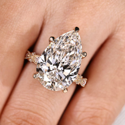 10 Carat Pear Shaped Diamond Ring with Marquise and Round Pave