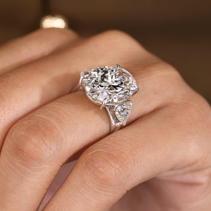 IGI Certified 10 -15 Carat Oval Diamond Ring in Three Stone Style