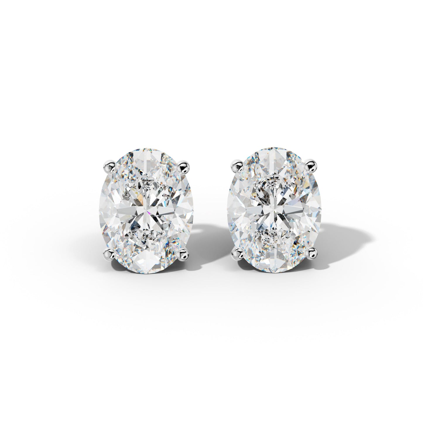 Four Prong Oval Diamond Stud Earrings - 1/2 - 18K White Gold