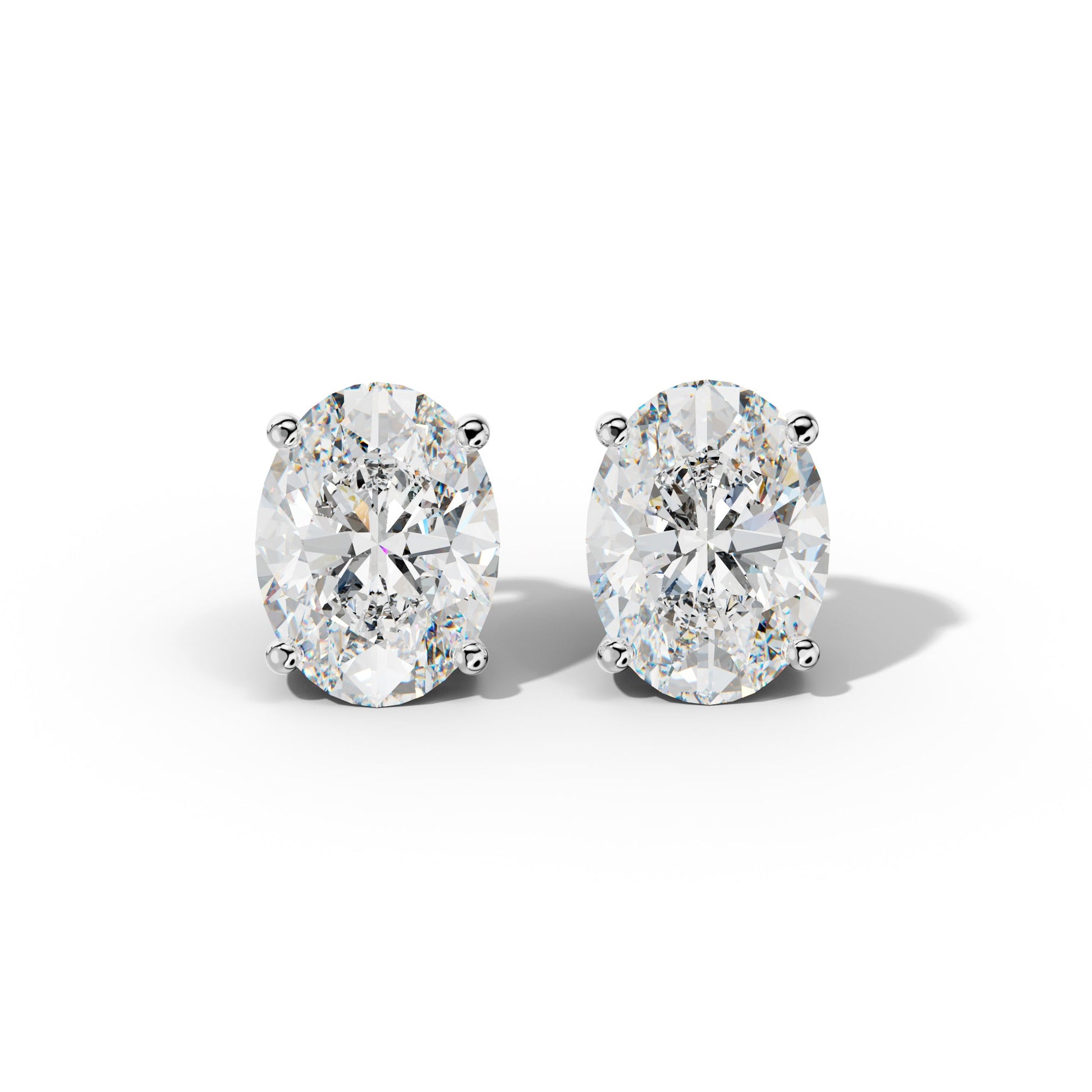 Four Prong Oval Diamond Stud Earrings - 1/2 - 18K White Gold
