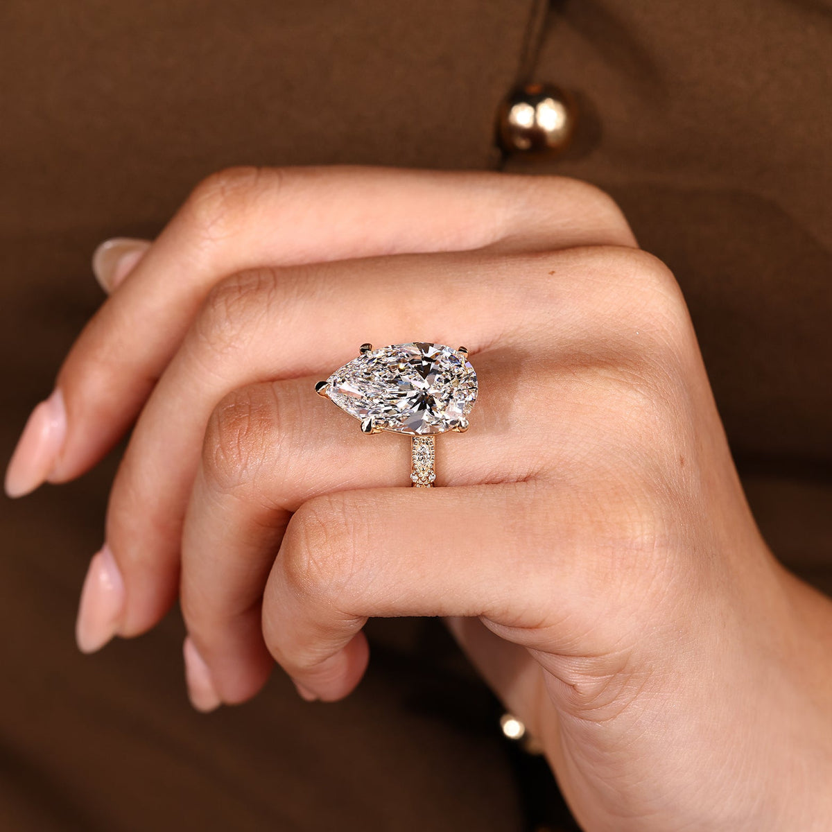 10 Carat Pear Shaped Diamond Ring with Marquise and Round Pave