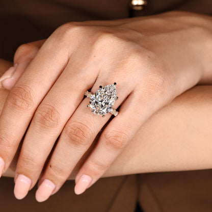 10 Carat Pear Shaped Diamond Ring with Marquise and Round Pave