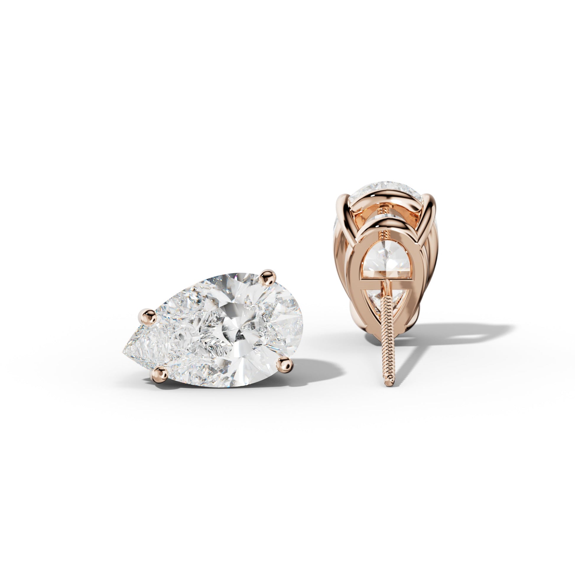 Pear Shape Diamond Stud Earrings With Classic Four Prongs - 1/2 - Platinum 950