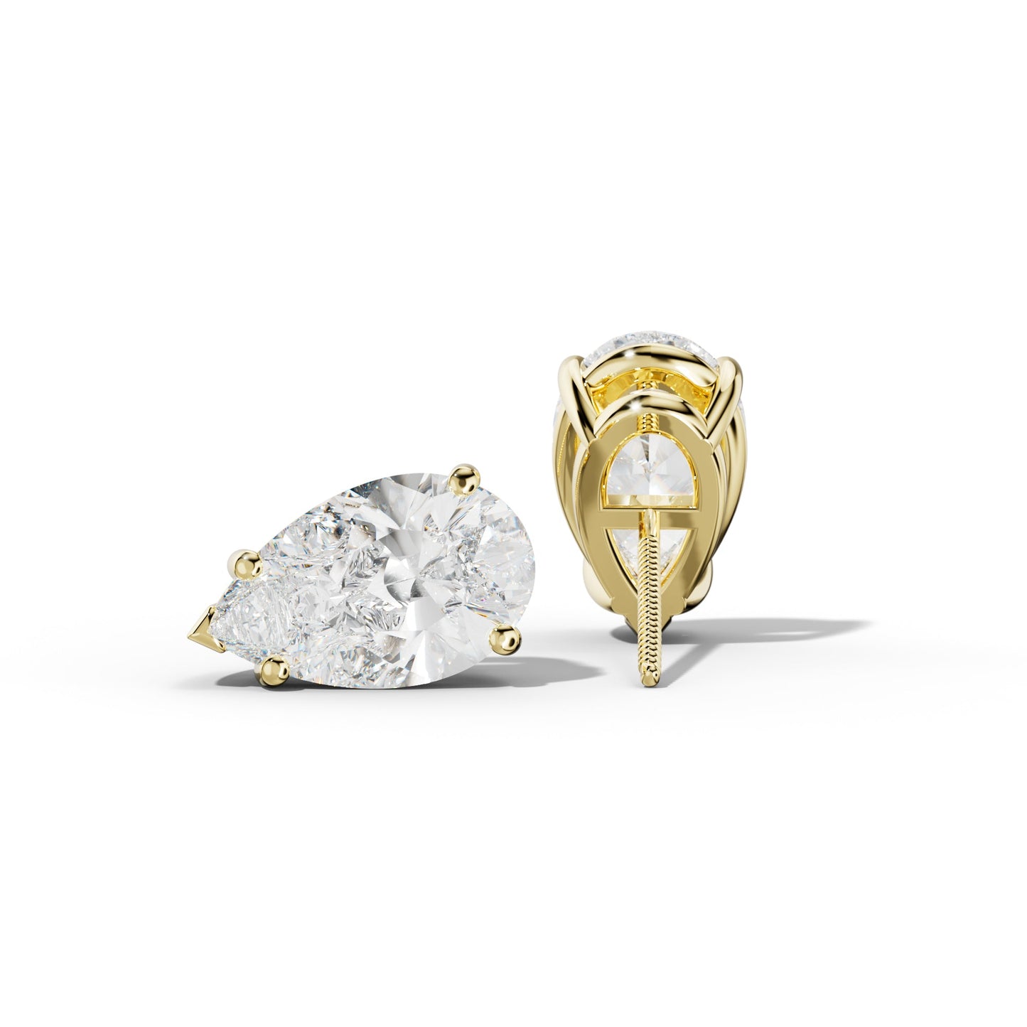 Pear Shape Diamond Stud Earrings With Four Classic And V Prongs - 1/2 - 18K Yellow Gold