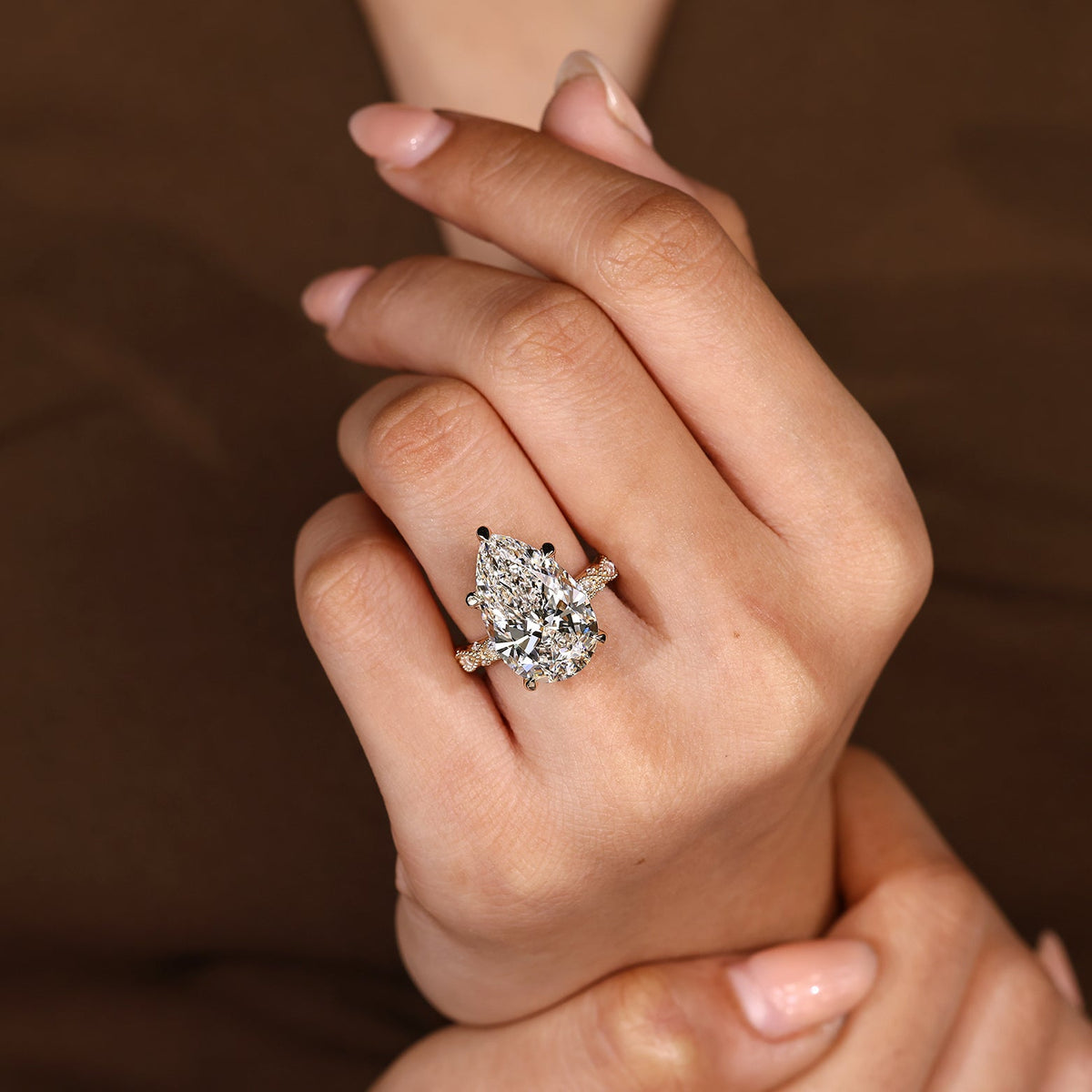 10 Carat Pear Shaped Diamond Ring with Marquise and Round Pave