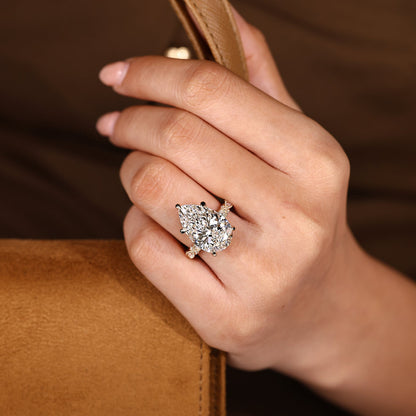 10 Carat Pear Shaped Diamond Ring with Marquise and Round Pave
