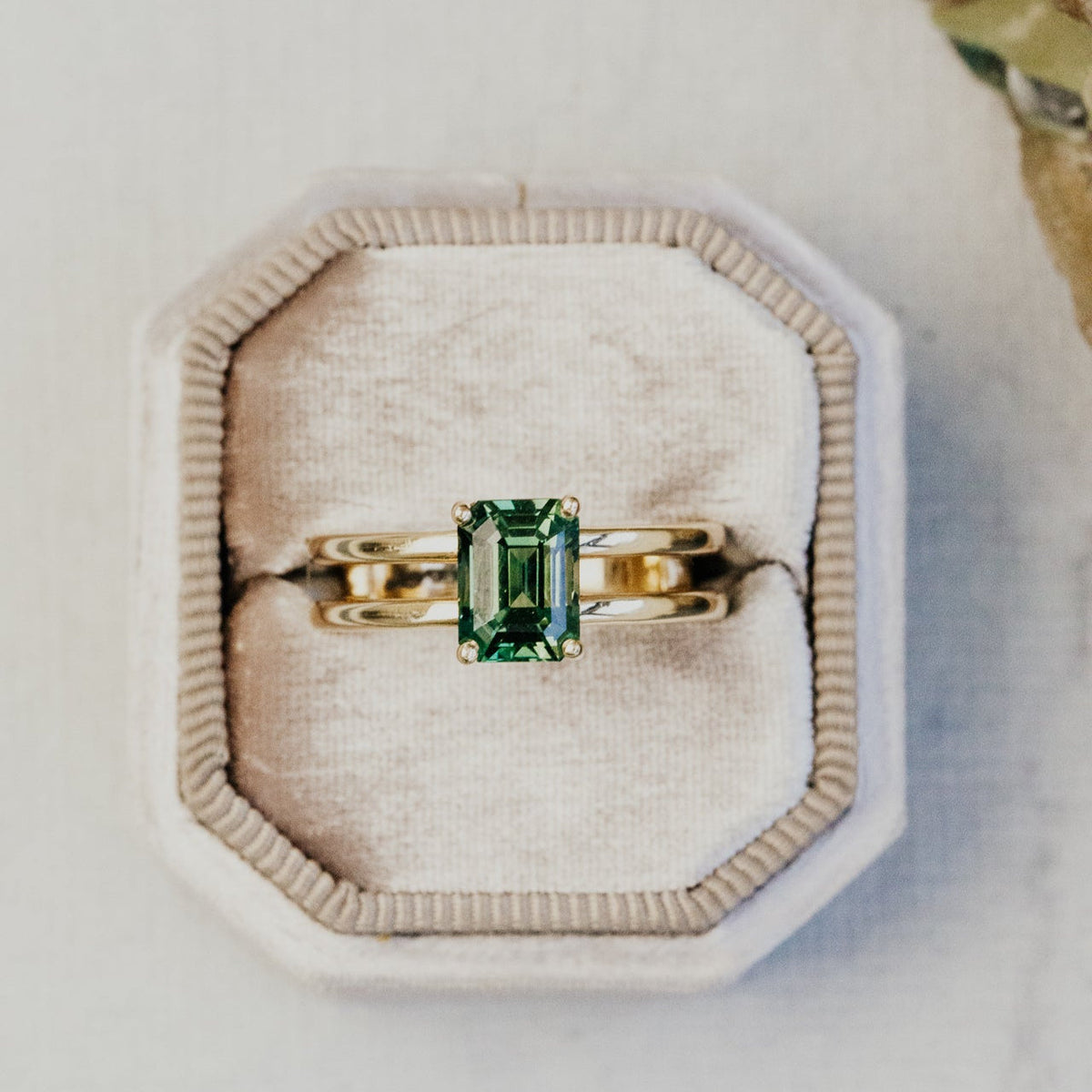 The Amanda Emerald Cut Teal Sapphire Double Band Solitaire