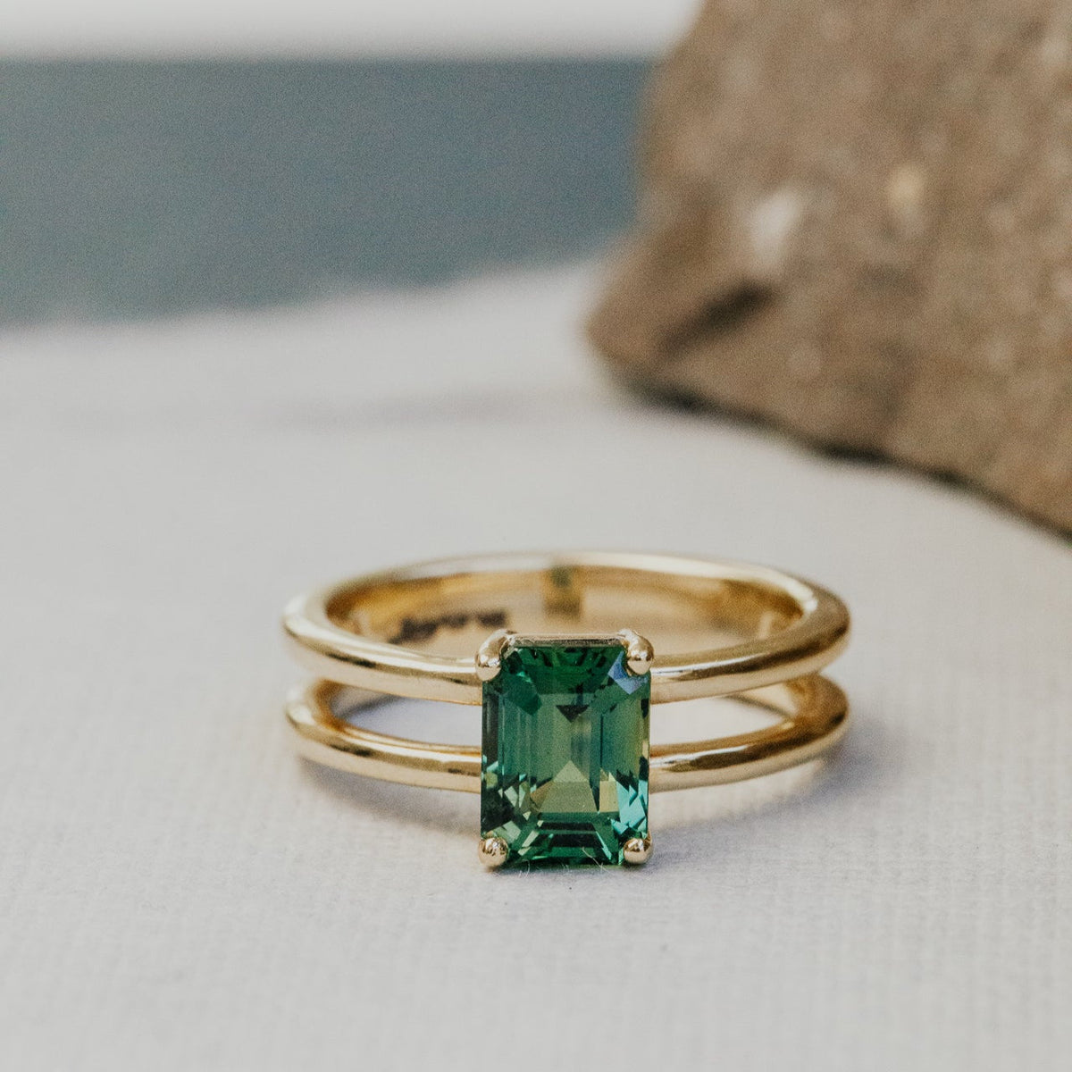 The Amanda Emerald Cut Teal Sapphire Double Band Solitaire