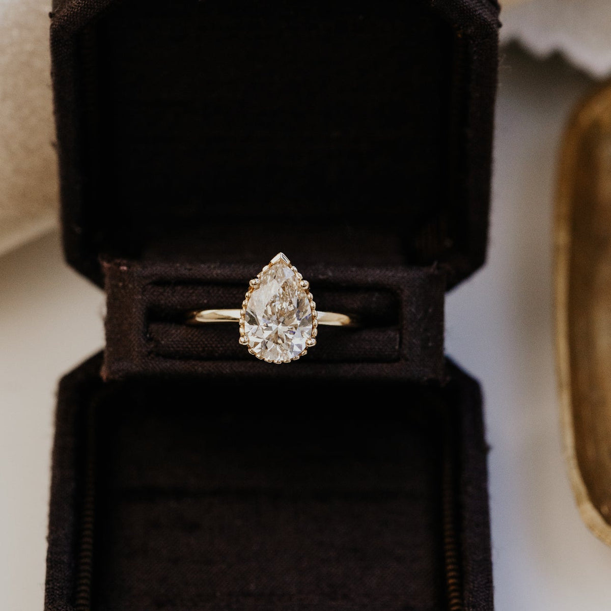 The Charlotte Pear Champagne Diamond Solitaire