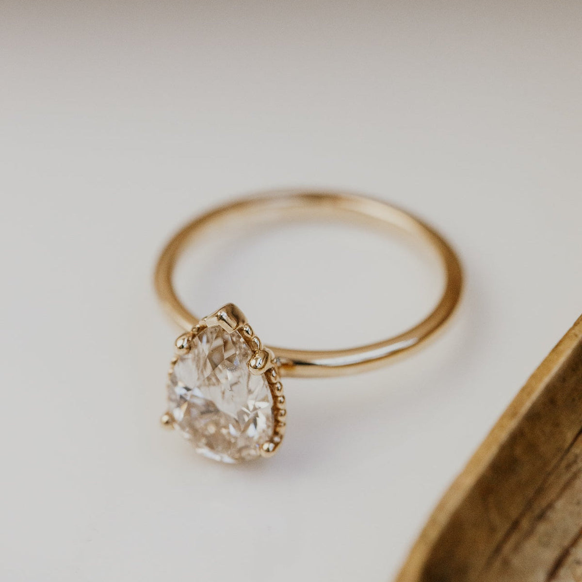 The Charlotte Pear Champagne Diamond Solitaire