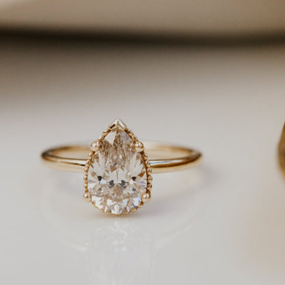 The Charlotte Pear Champagne Diamond Solitaire