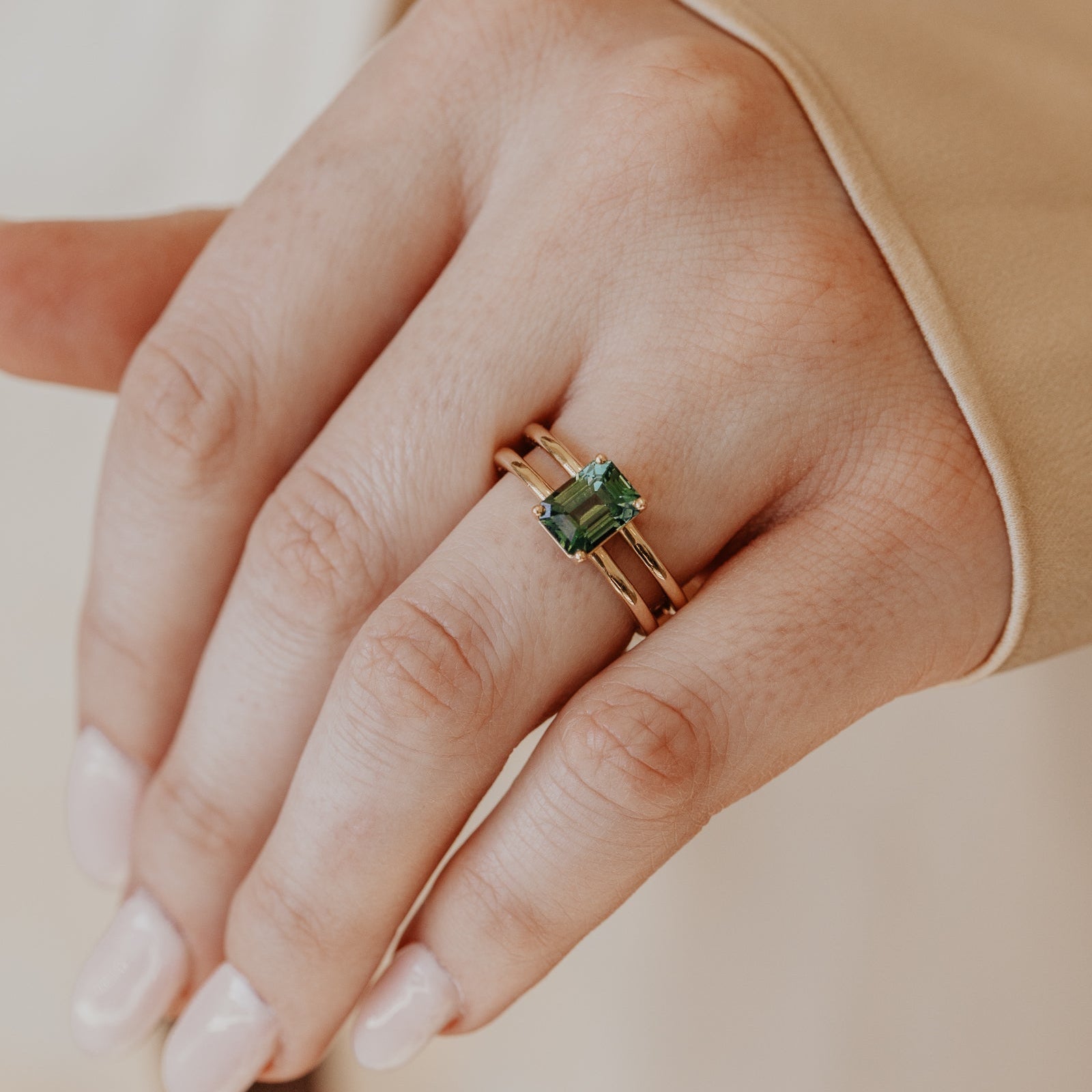 The Amanda Emerald Cut Teal Sapphire Double Band Solitaire