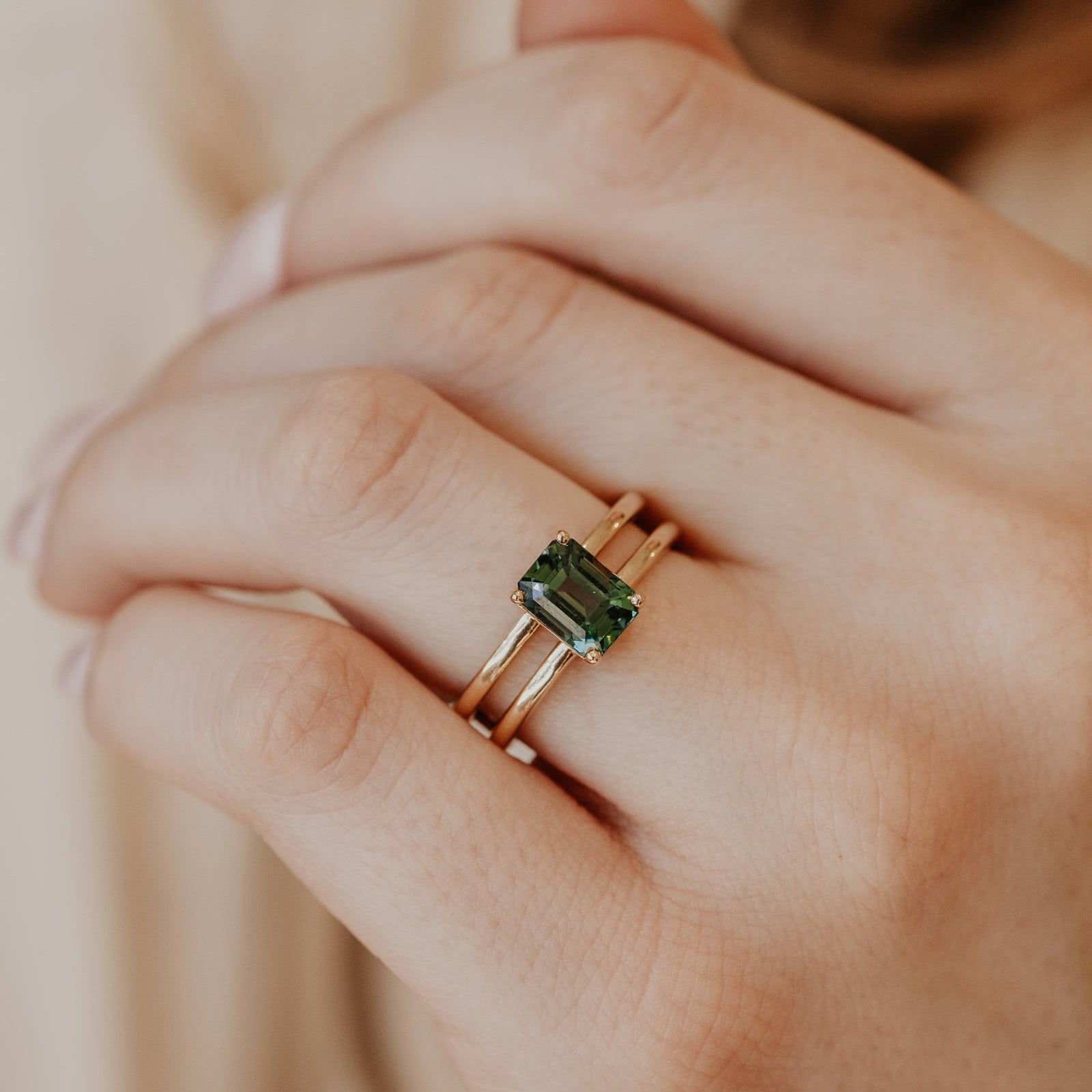 The Amanda Emerald Cut Teal Sapphire Double Band Solitaire