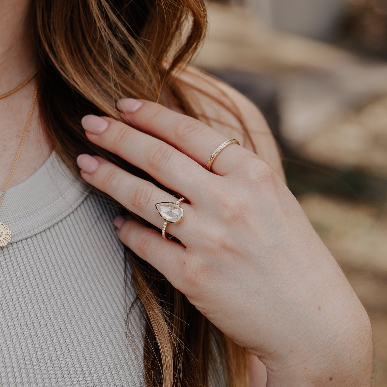 The Lyell Pear Clear and Peach Rustic Diamond Ring