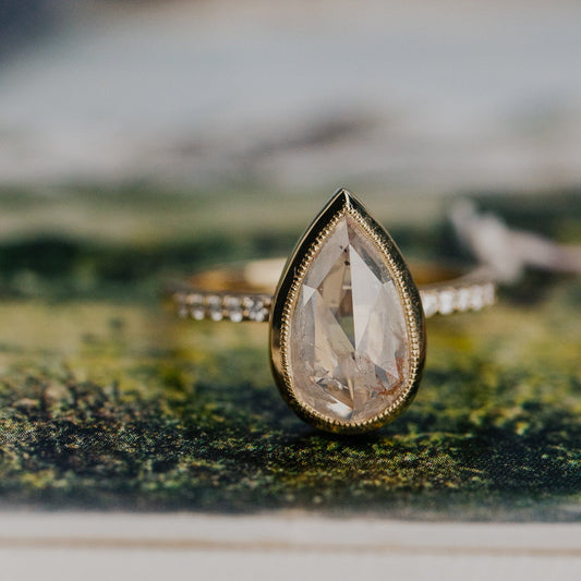 The Lyell Pear Clear and Peach Rustic Diamond Ring