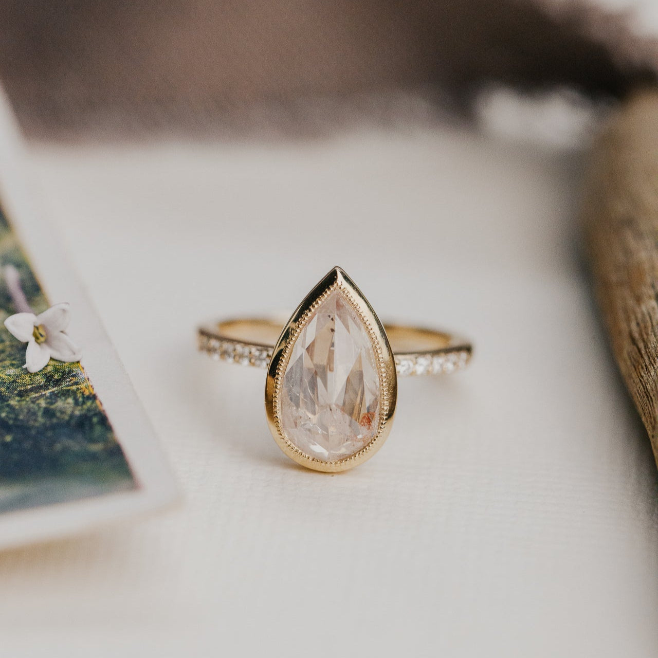 The Lyell Pear Clear and Peach Rustic Diamond Ring