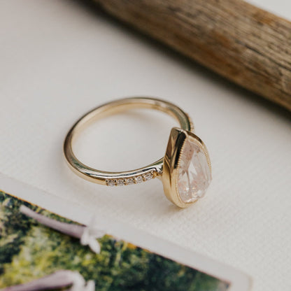 The Lyell Pear Clear and Peach Rustic Diamond Ring