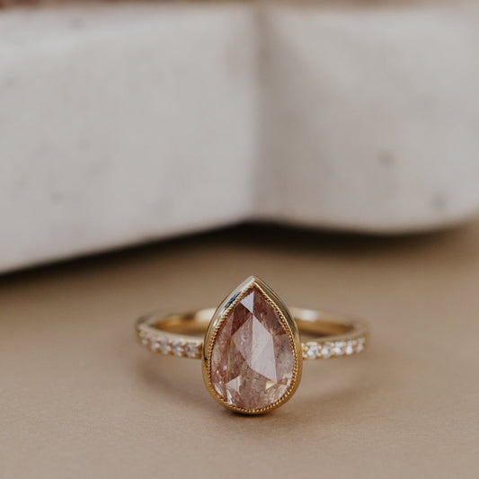 The Lyell Pear Clear and Peach Rustic Diamond Ring