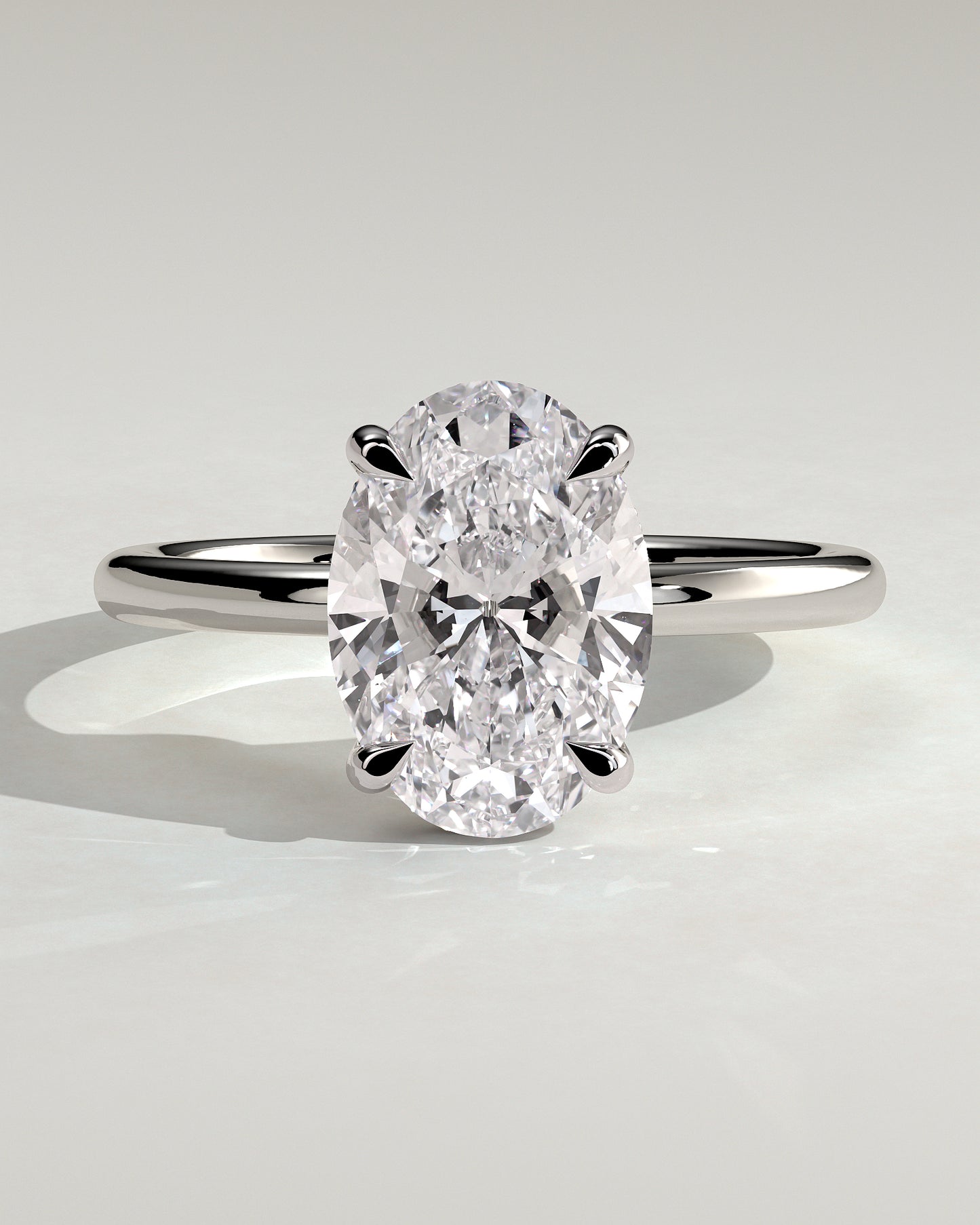 Emma - Classic Oval Claw Solitaire with Hidden Halo Engagement Ring - Platinum - White Gold / Platinum