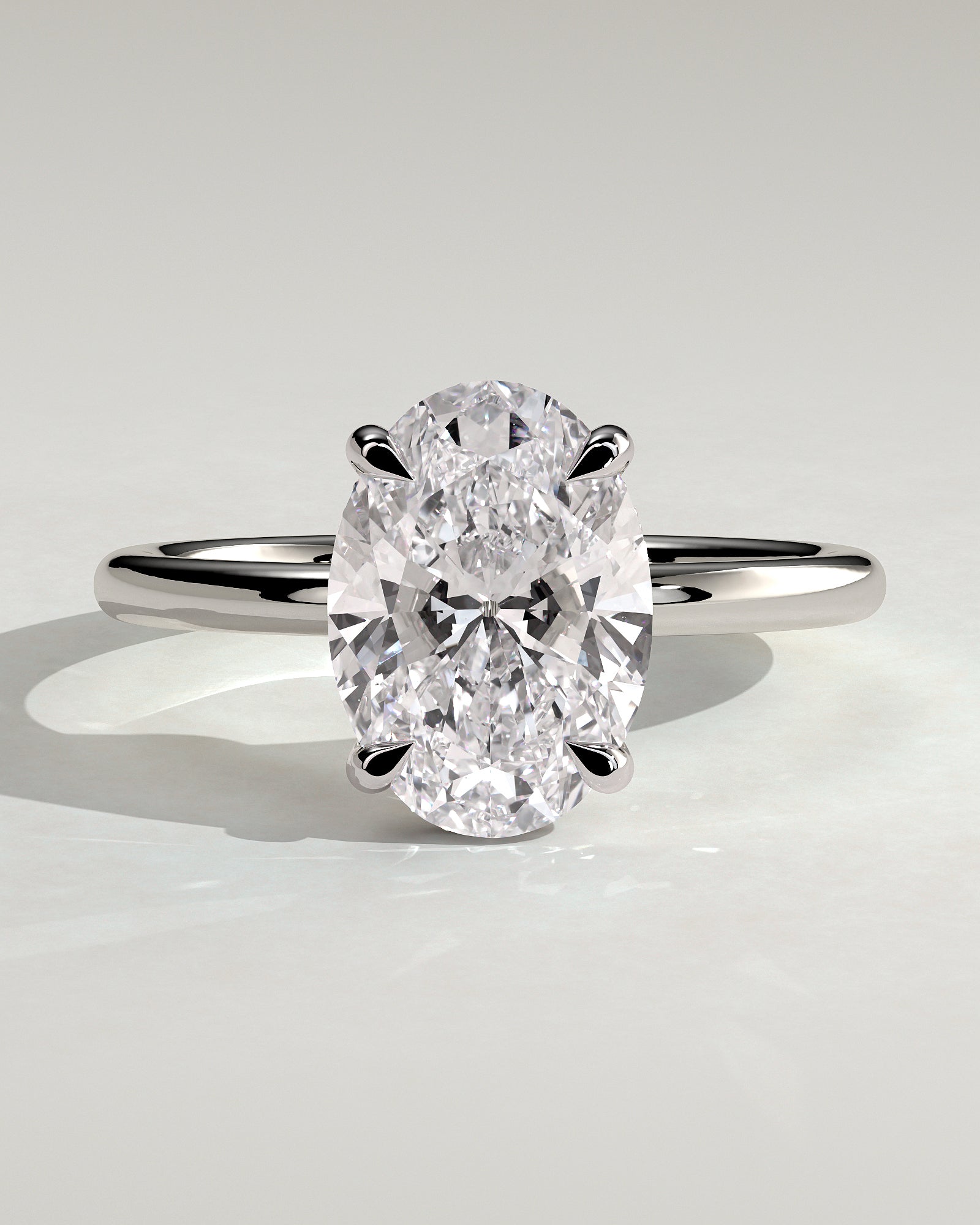 Emma - Classic Oval Claw Solitaire with Hidden Halo Engagement Ring - Platinum - White Gold / Platinum