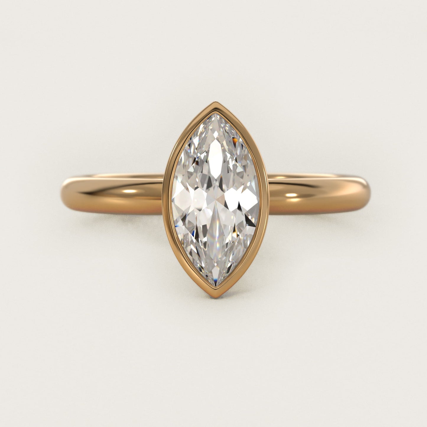 Bezel Solitaire Engagement Ring in 18k Yellow Gold - Marquise Center
