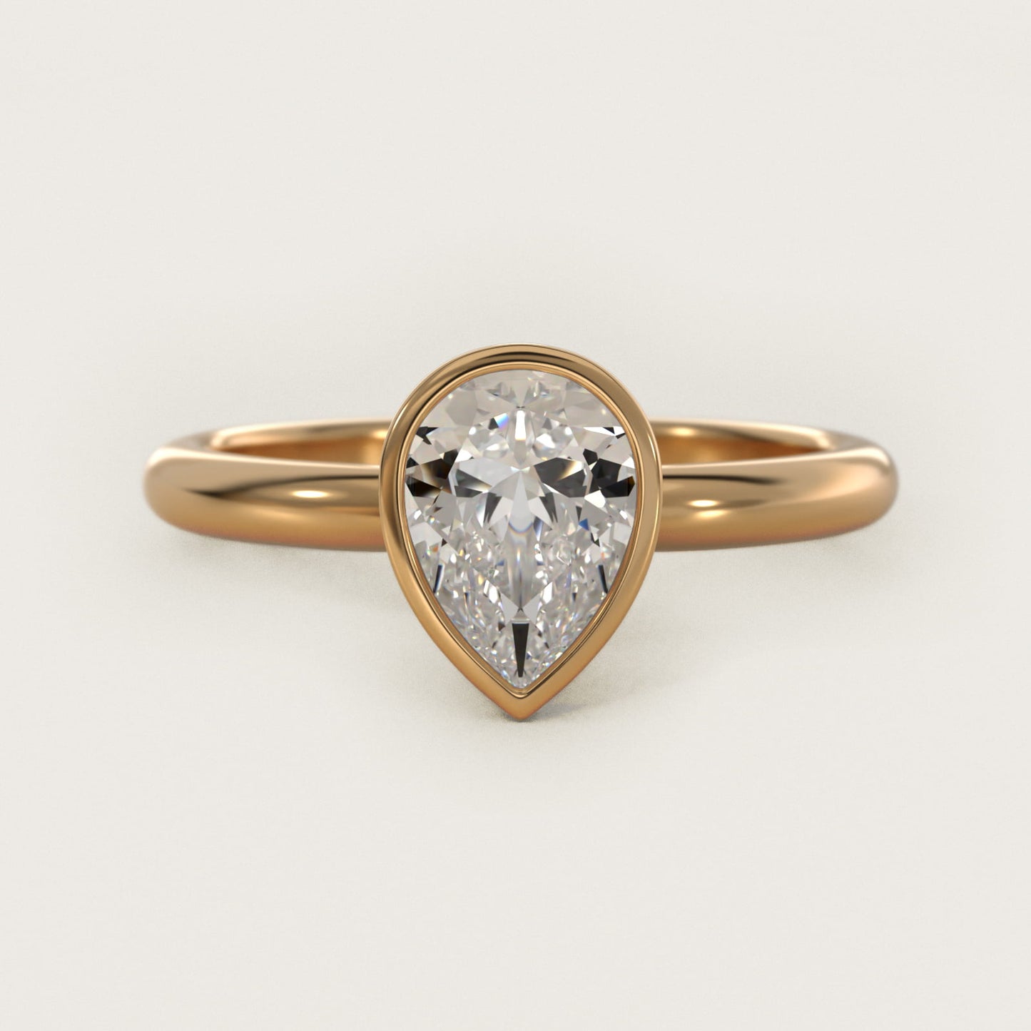 Bezel Solitaire Engagement Ring in 18k Yellow Gold - Pear Center