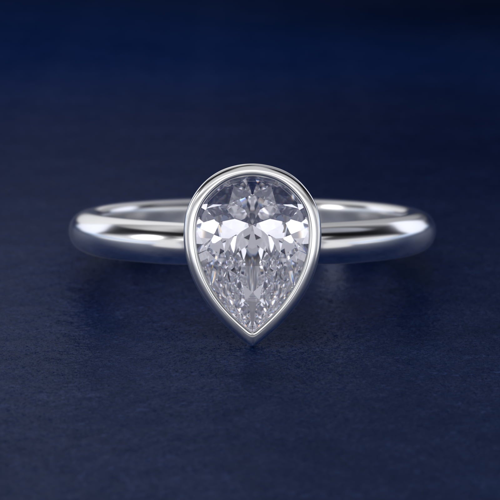Bezel Solitaire Engagement Ring in Platinum - Pear Center