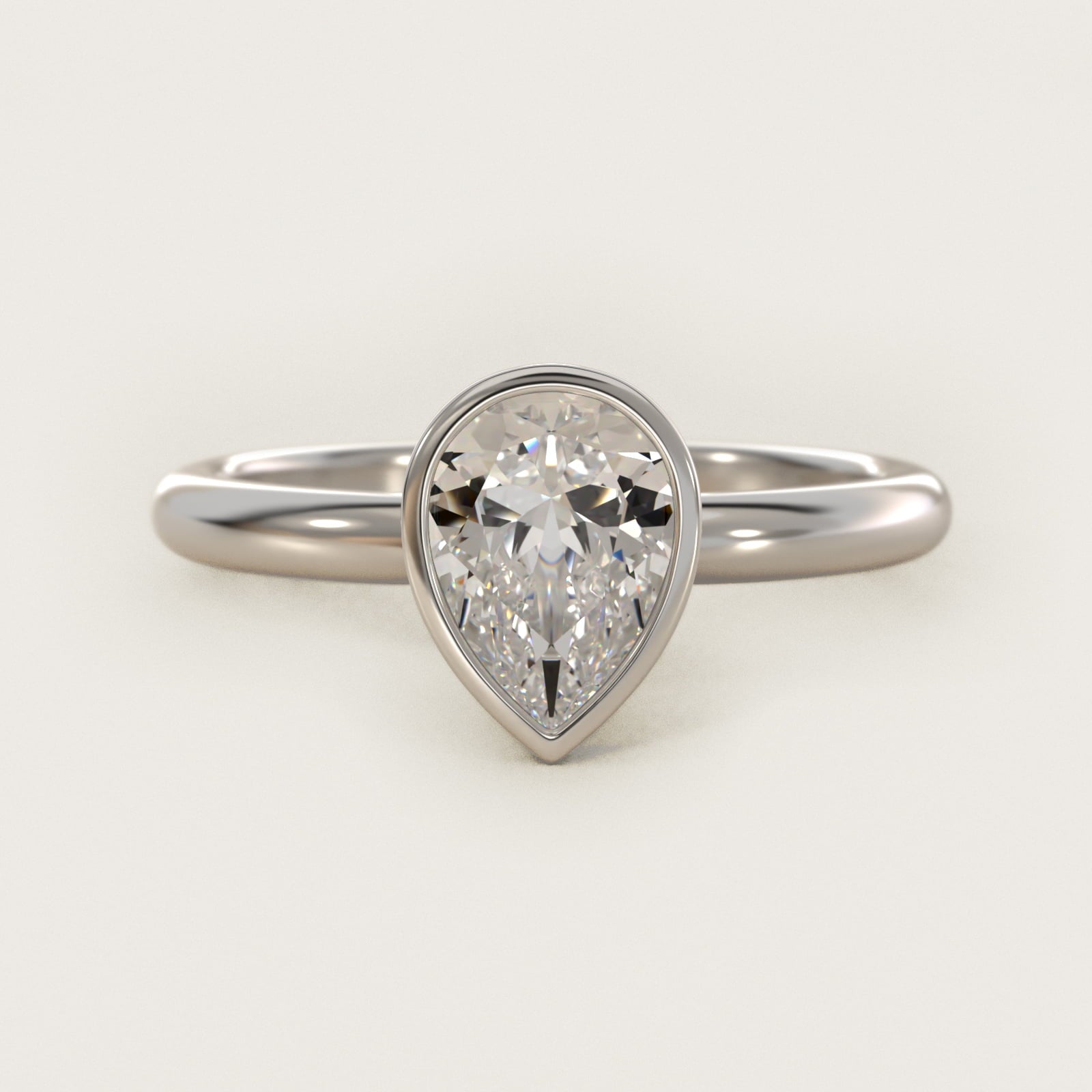 Bezel Solitaire Engagement Ring in Platinum - Pear Center