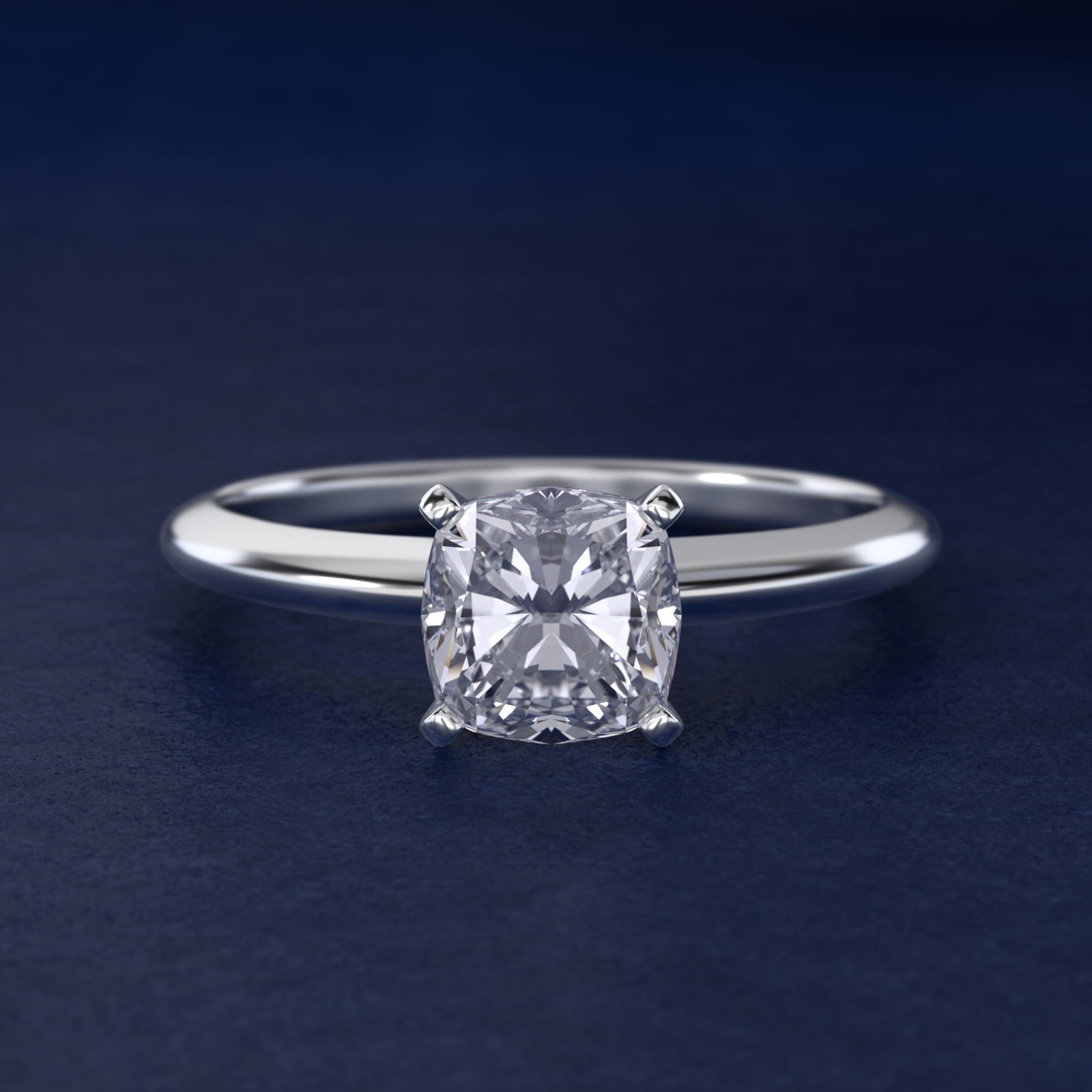 Classic Four Prong Solitaire Engagement Ring in Platinum - Cushion Center