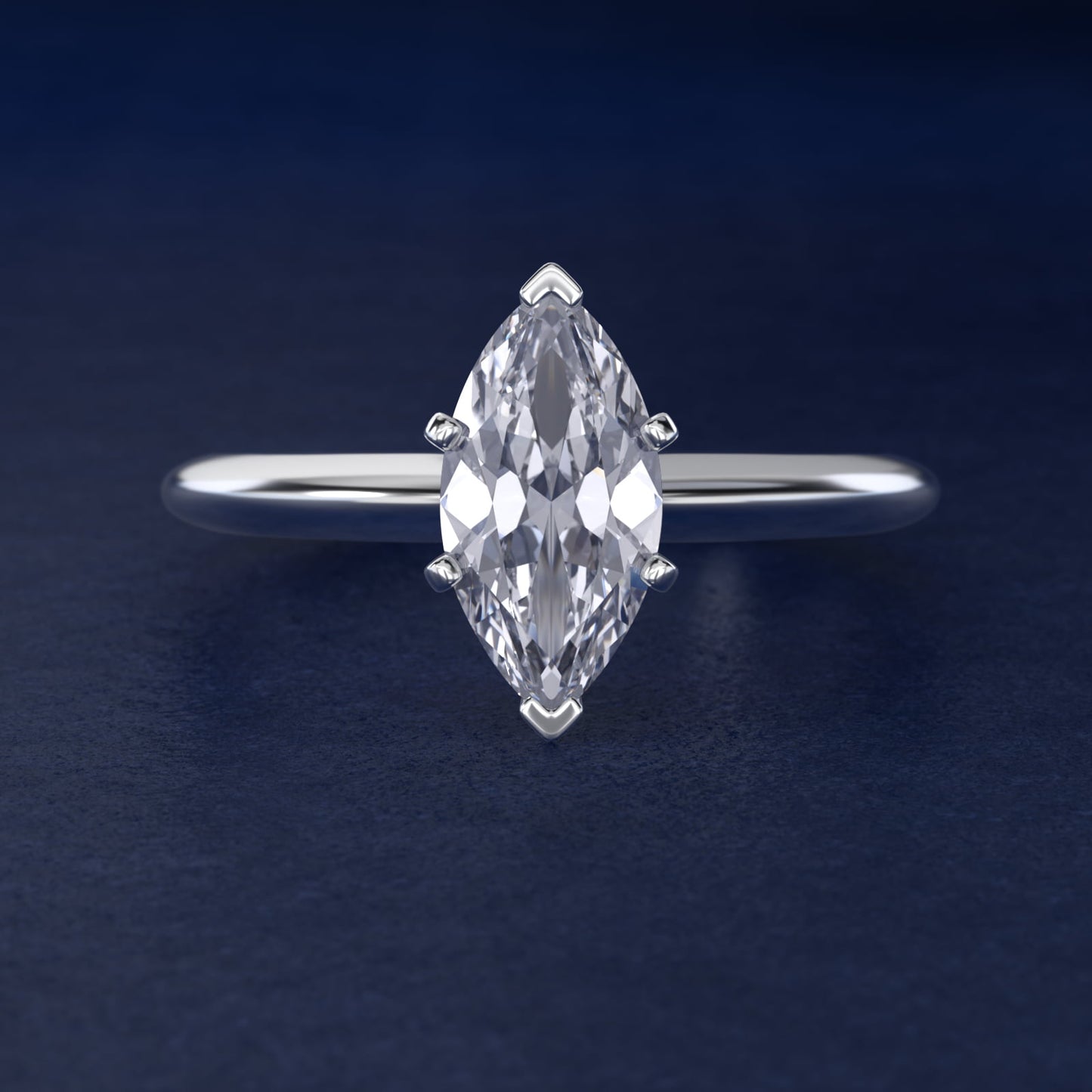 Classic Four Prong Solitaire Engagement Ring in Platinum - Marquise Center