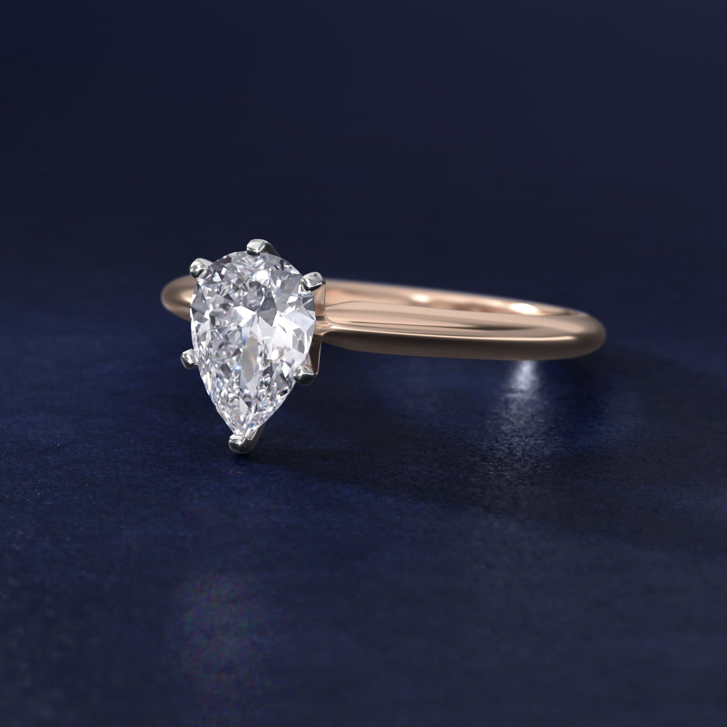 Classic Four Prong Solitaire Engagement Ring in 14K Rose Gold - Pear Center