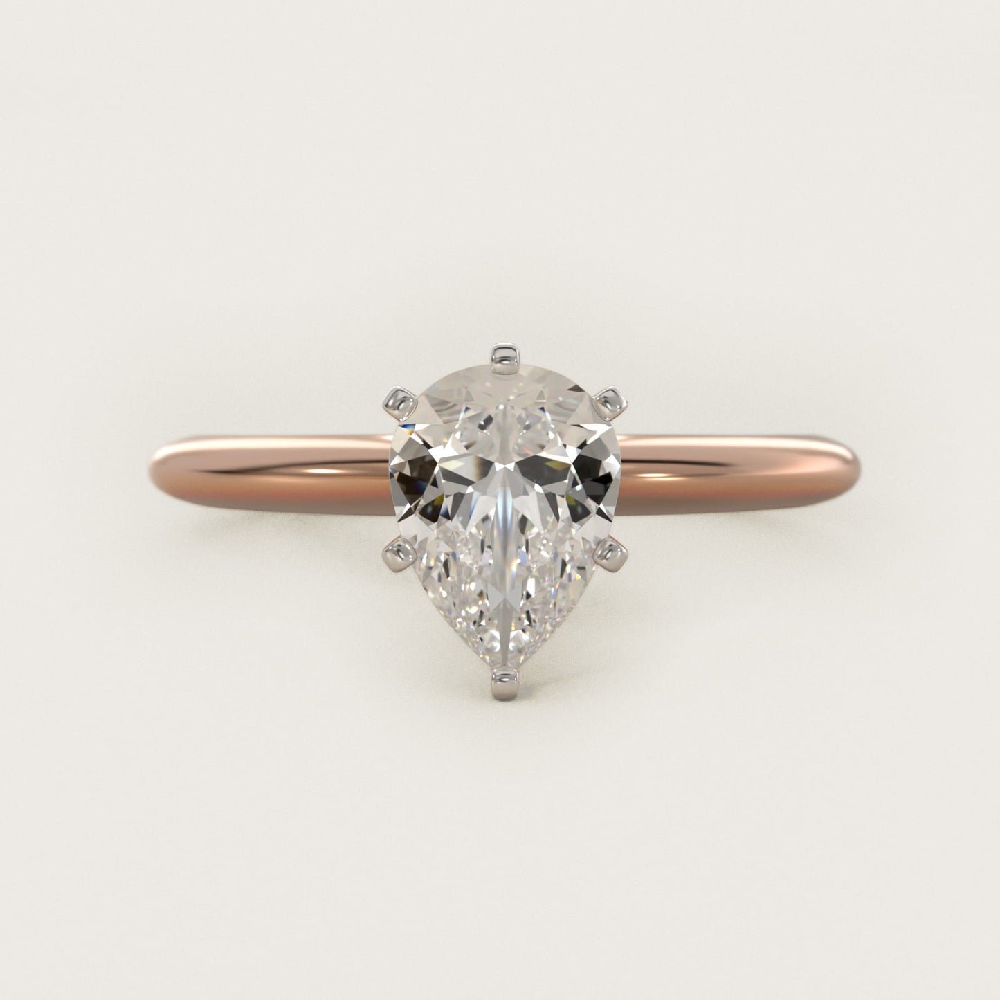 Classic Four Prong Solitaire Engagement Ring in 18k Rose Gold - Pear Center